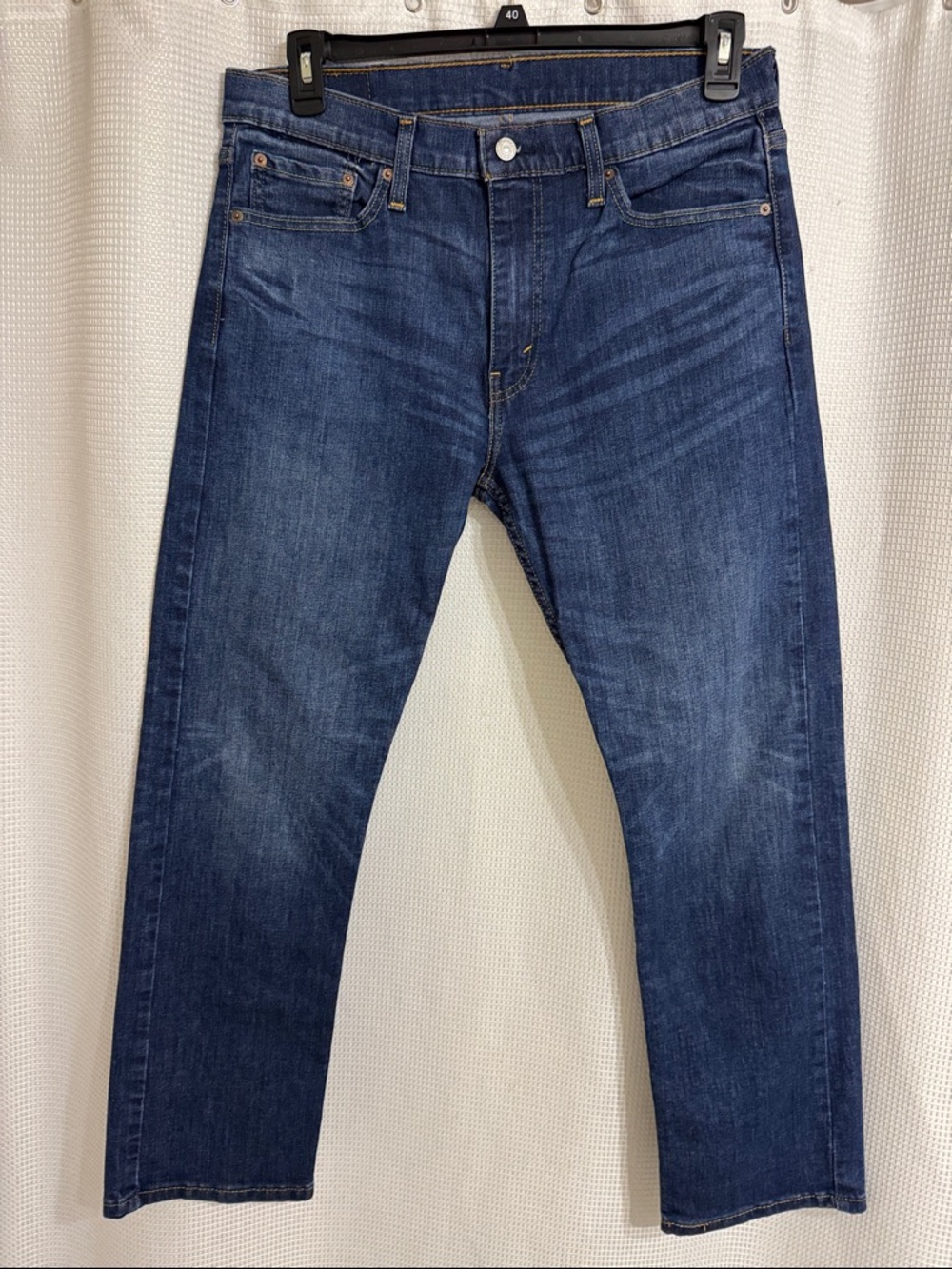 Mens Levi Strauss 513 medium wash denim jeans. Size 33/30